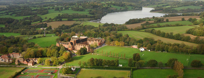 Ardingly College with lake, greens and sport fields Area view of Ardingly College in England